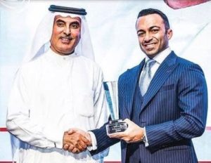 Abdul Aziz Al Ghurair receiving Outstanding Achievement award