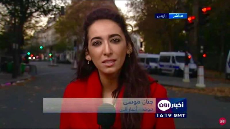 A still of Jenan Moussa reporting news on Al Aan TV network