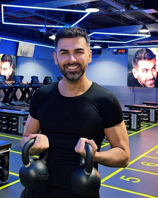 Saygin Yalcin working out at the gym