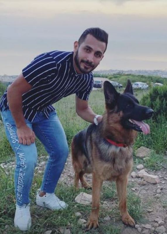 Alaa Mezher's photo with a dog