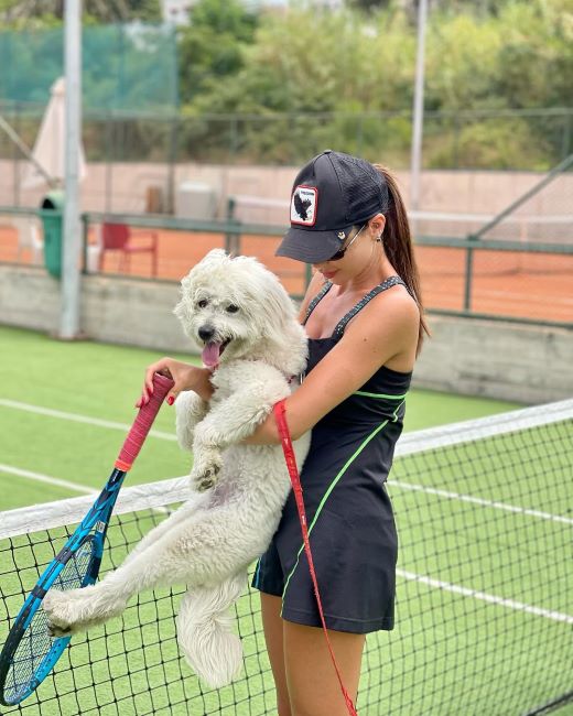 Dalida Khalil holding a Poodle