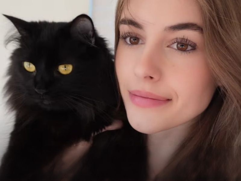 Eva Cudmore with her cat, Touka