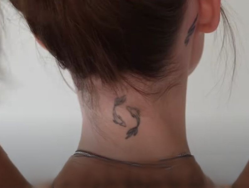 Eva Cudmore's tattoo behind her neck
