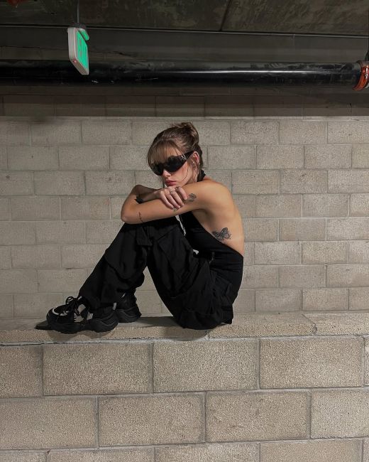 Eva Cudmore's tattoo on her left ribs