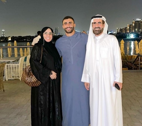 Khalid Alherani with his parents
