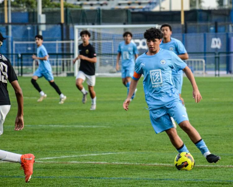 Saif Alhaj Ahmad playing football in the Man City Abu Dhabi League