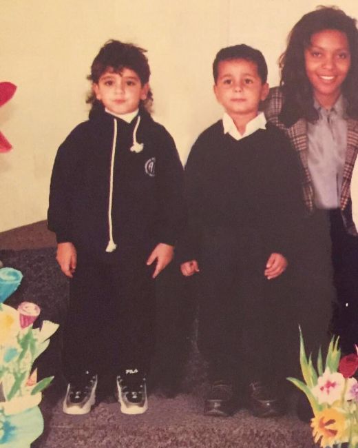 Tayam Amar (left) during his childhood