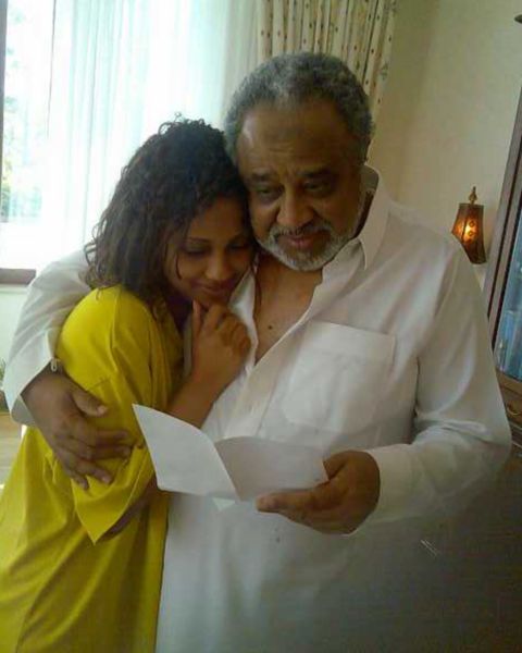 Mohammed Hussein Al Amoudi with one of her daughters