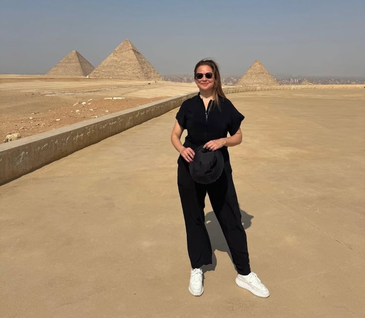 Raya Abirached in front of the Pyramids of Giza, Egypt