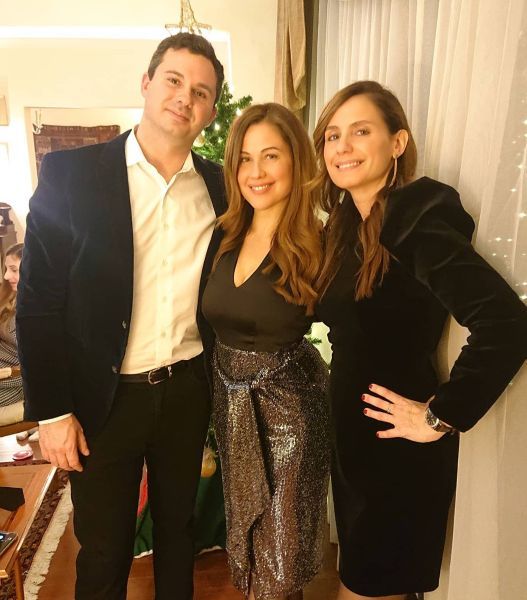 Raya Abirached (middle) with her brother and sister
