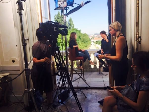Raya Abirached (second from left) during an interview with Tom Cruise