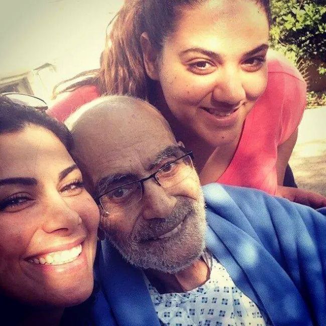Saba Mubarak with her sister and her father