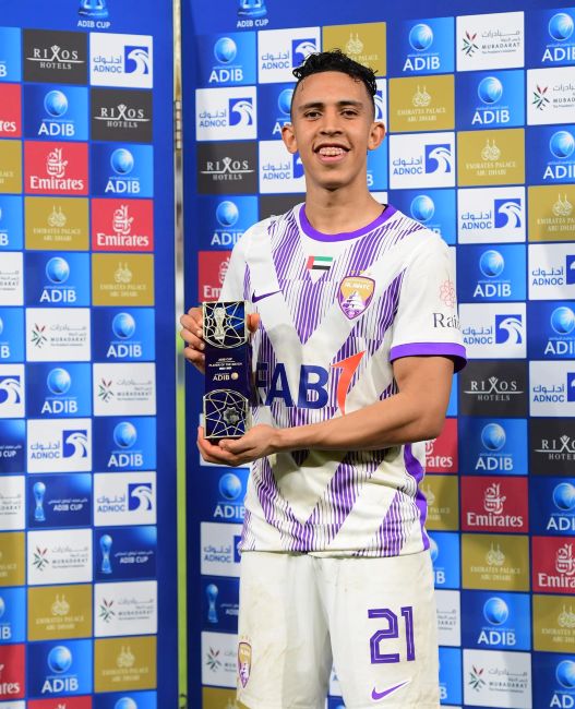 Soufiane Rahimi holding the ADIB Cup Player of the Match award