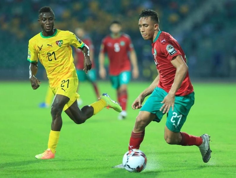 Soufiane Rahimi wearing jersey number 21 and playing for Morocco national football team