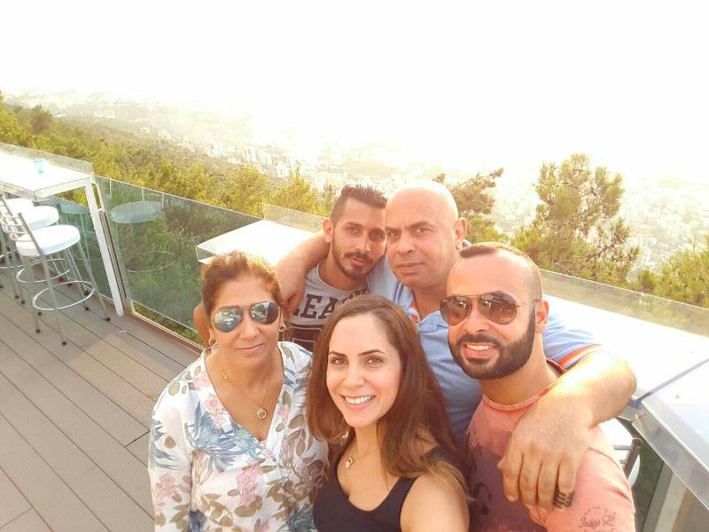 Alaa Mezher with his family including his father, mother, brother, and sister