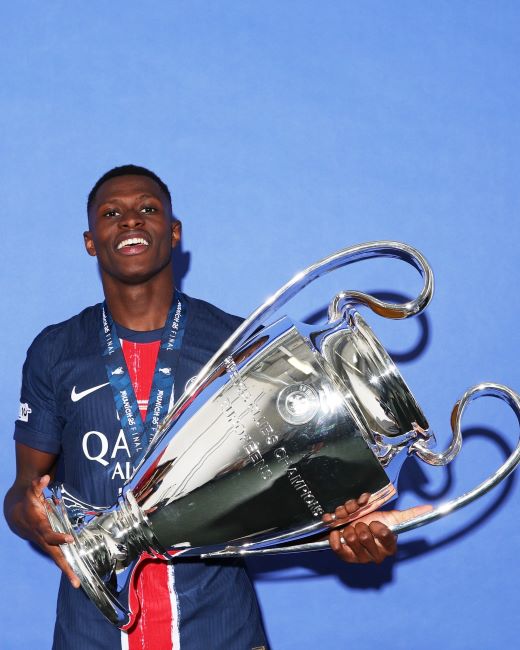 Nuno Mendes holding the UEFA Champions League trophy (2025)