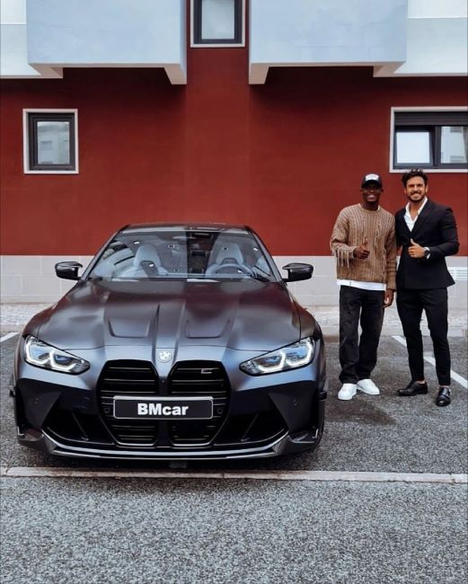 Nuno Mendes standing beside his BMW M4