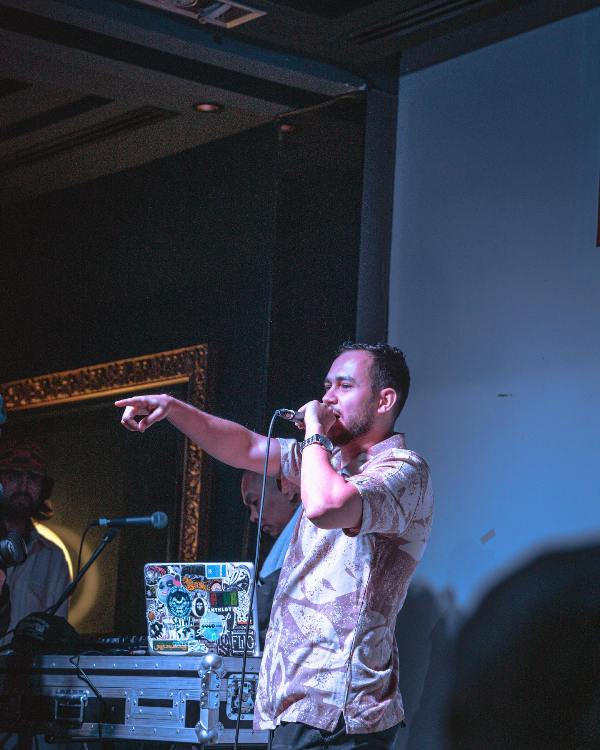 Photo of KAFV while singing in a lounge